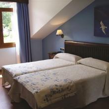 Espaciosas habitaciones en Hotel Bufon de Arenillas. Relájate con nuestra oferta en Asturias